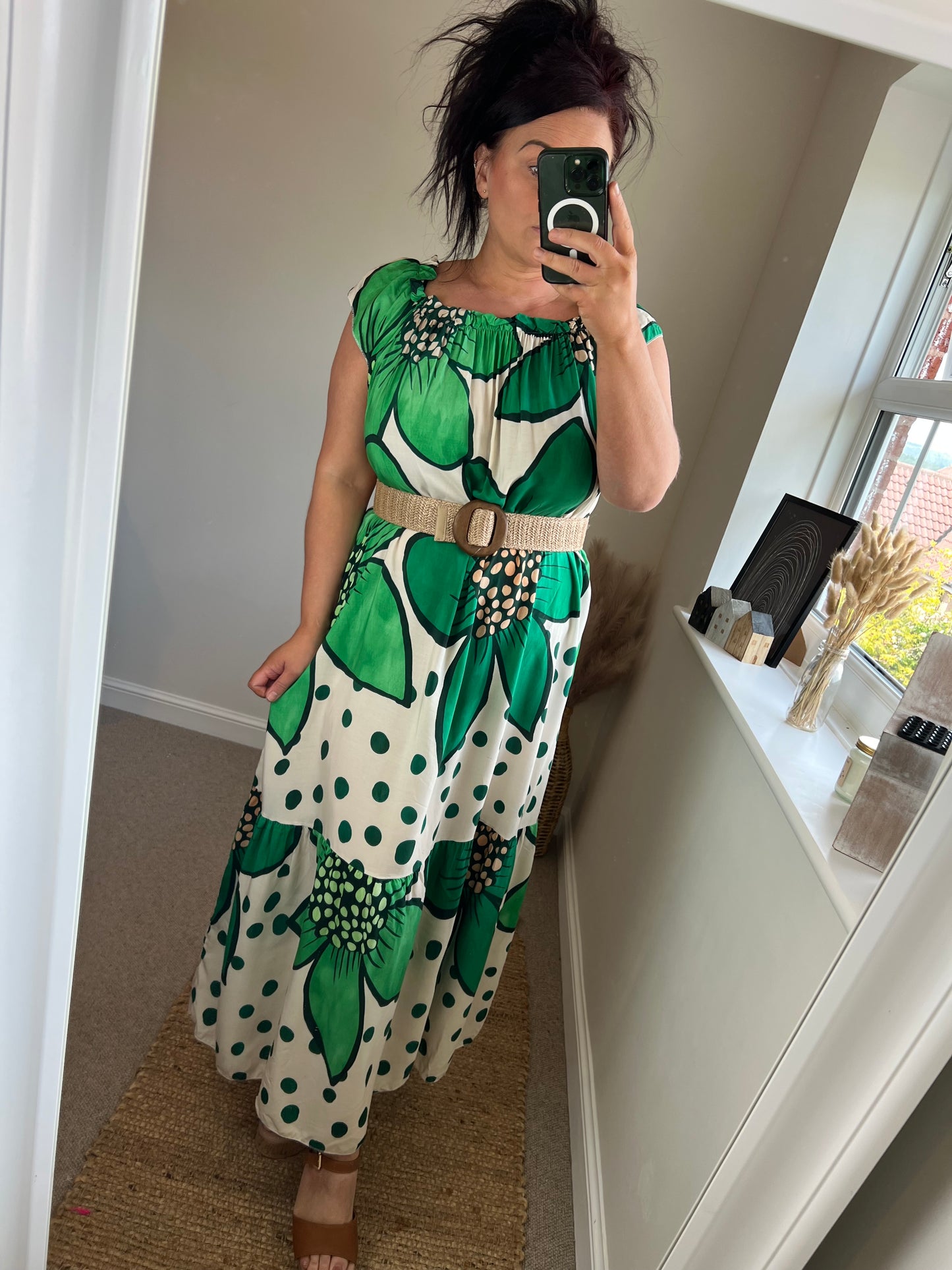 Women’s blue floral maxi dress with oversized flower print and polka dots on ivory background, relaxed fit with gathered neckline, styled with belt