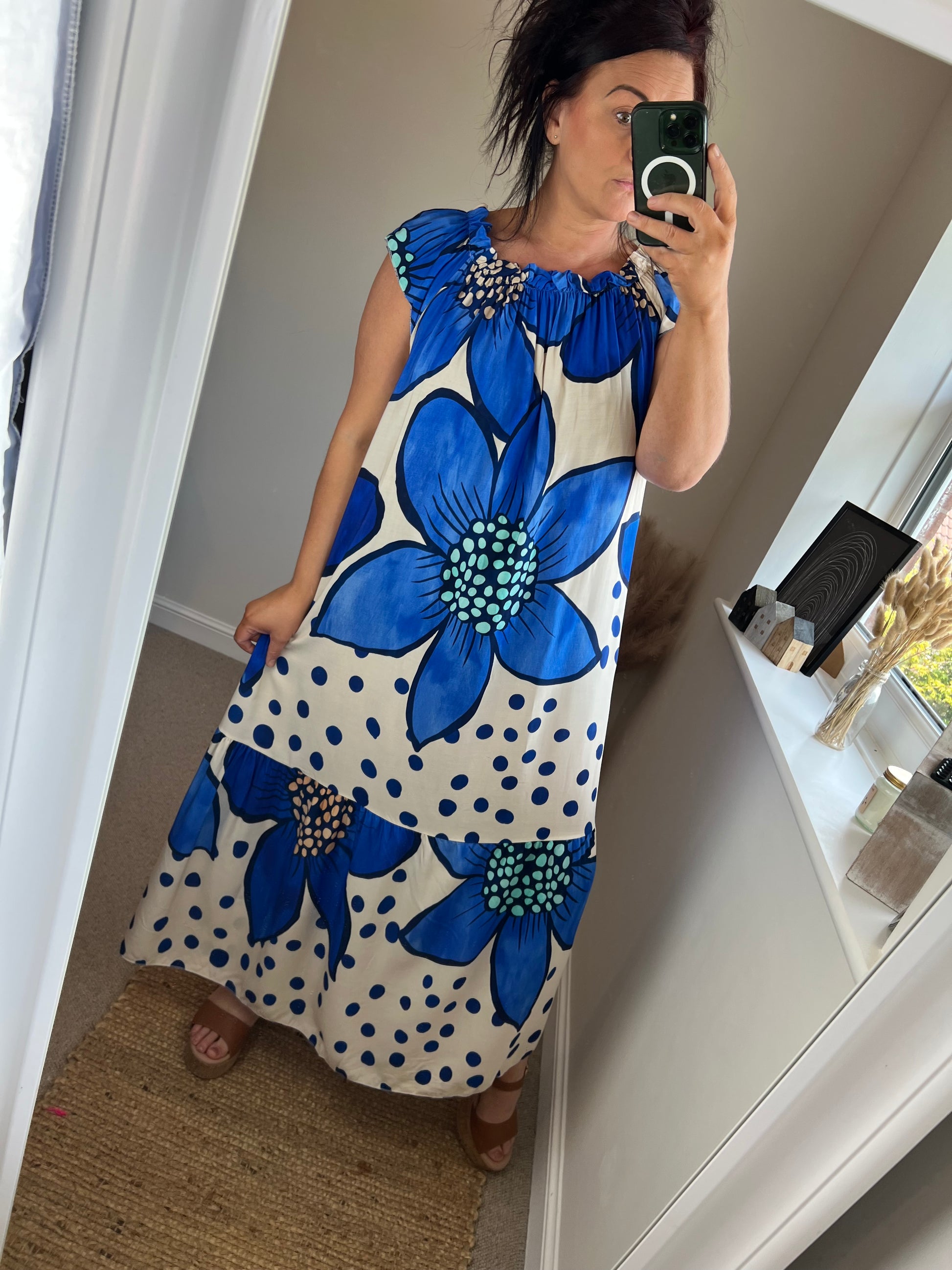 Front view Women’s blue floral maxi dress with oversized flower print and polka dots on ivory background, relaxed fit with gathered neckline