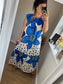Front view Women’s blue floral maxi dress with oversized flower print and polka dots on ivory background, relaxed fit with gathered neckline
