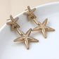 Peace of Mind - Silver Plated Starfish Earrings - Gold