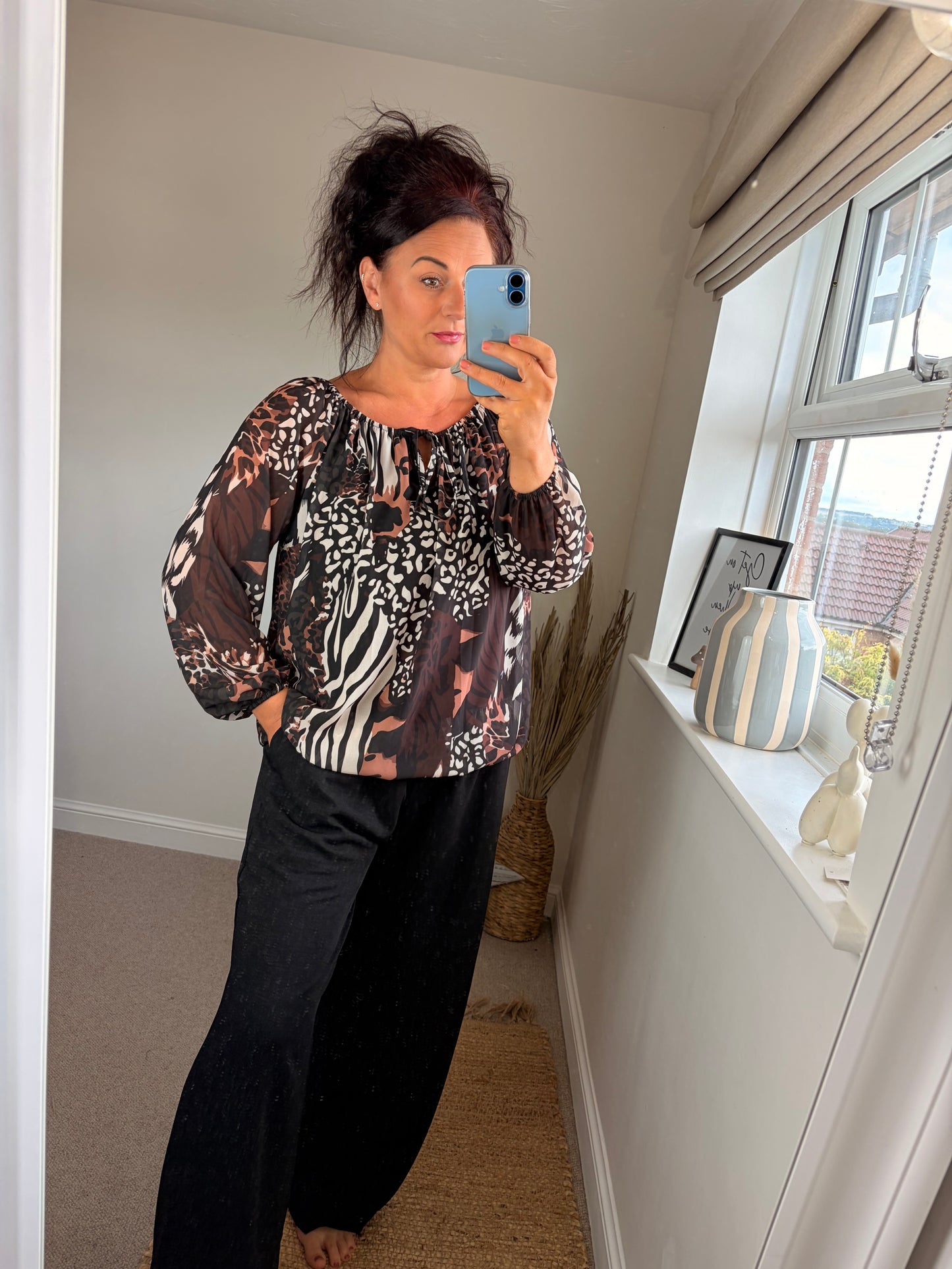 Bubble Hem Animal Print Top - Black